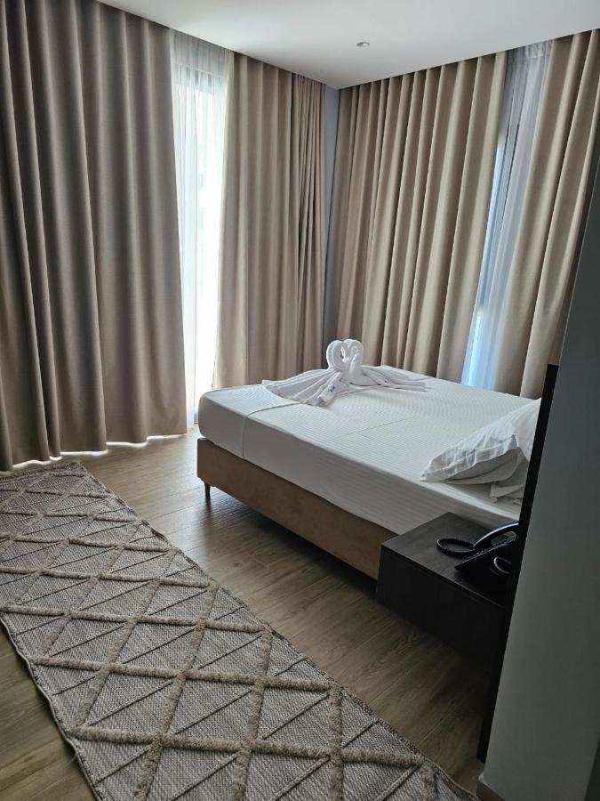 Kaan Hotel Radhime Luaran gambar
