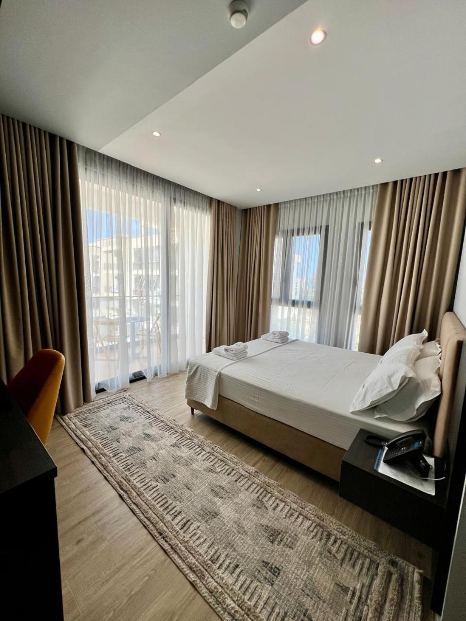 Kaan Hotel Radhime Luaran gambar